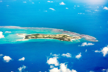 Fototapeta na wymiar Landscape from airplane, from Okinawa to Yoron island