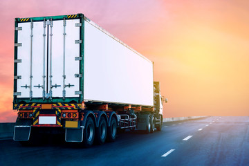 Truck on highway road with white container, transportation concept.,import,export logistic industrial Transporting Land transport on asphalt expressway with sunrise sky