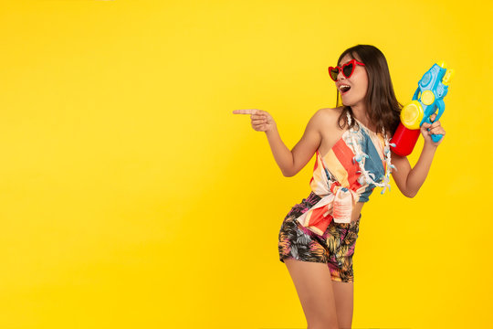 Summer Young Beautiful Woman With Water Gun , Songkran Holidays