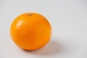Fresh oranges on a white background