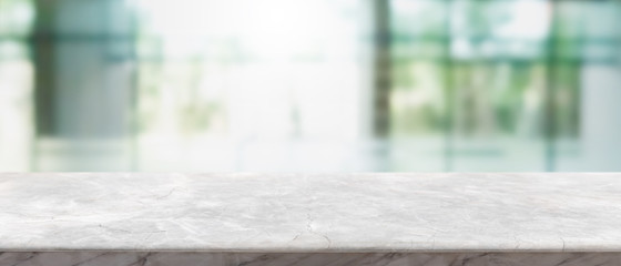 Empty white marble stone table top and blur glass window interior lobby and hall way banner mock up...