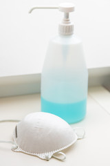 White medical mask an gel hydroalcoholic