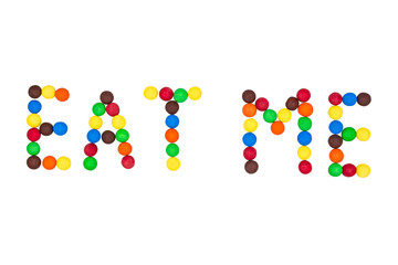 There is an inscription eat me with colored candies