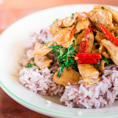 Rice topped with stir-fried pork and basil