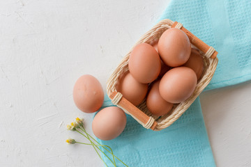 Chicken Egg in a basket on  table