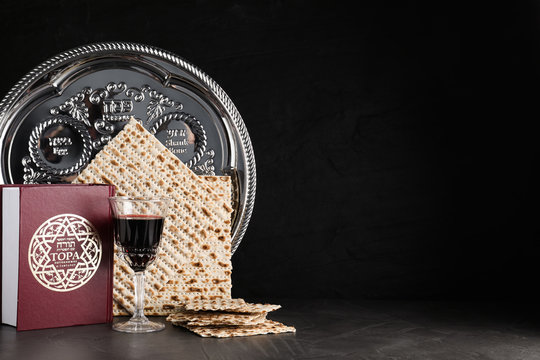 Symbolic Pesach (Passover Seder) Items On Black Table, Space For Text