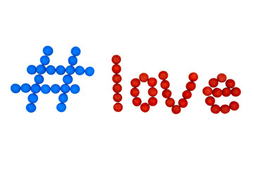 The hashtag love is made up of colored candies