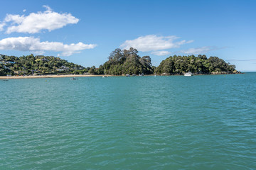 Naklejka premium boats at buoy mooring in bay, Kaiteriteri, Abel Tasman park, New Zealand