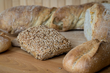 Fresh Bread On Wooden Table
