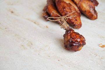  fried chicken wings with spices, herbs and soy sauce.
