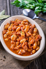 Baked beans in tomato sauce with chopped sausage