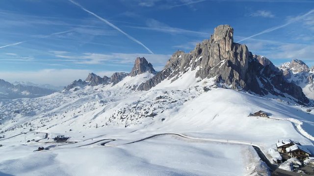 Wide epic winter landscape in the Alps. Aerial of dolomites on passo giau in 4K