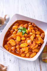 Baked beans in tomato sauce with chopped sausage