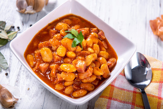Baked beans in tomato sauce with chopped sausage