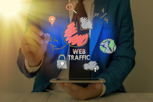 Conceptual hand writing showing Web Traffic. Concept meaning the amount of data sent and received by visitors to a website