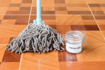 Baking soda with mop for floor cleaning