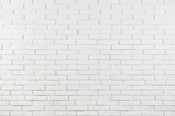 Obraz premium White brick wall as background. Simple design