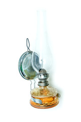 The traditional old retro or vintage petroleum lamp isolated in a white background. 