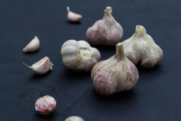 Garlic on  black table