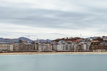 Views from the sea of the coast and the city of Donostia, San Sebastian, Spain