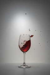 red wine splash in glass