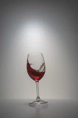 red wine splash in glass
