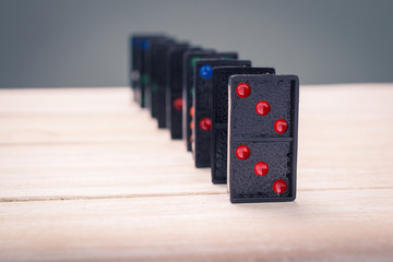 Fototapeta premium Dominoes on a wooden table.