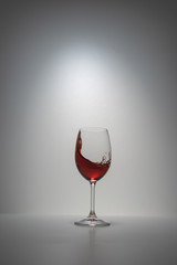 red wine splash in glass