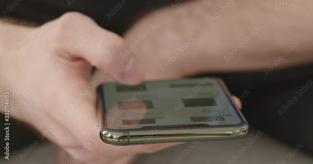 Aufkleber man scrolling pictures on device screen, close up