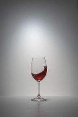 red wine splash in glass