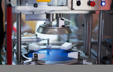 Recycle plastic bottle stack to conveyor line . Plastic recycling industry is recovering scrap or waste plastic from recycle bin to useful products. pile of reused material at recycling factory.