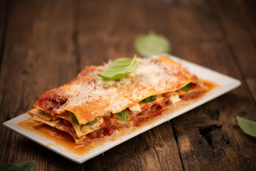 Italian lasagne with meat, tomatoes, cheese sauce and pasta