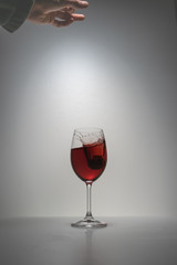 red wine splash in glass