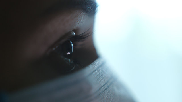 close up portrait of a woman surgeon or doctor with mask