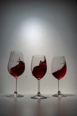 red wine splash in glass