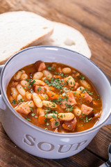 Baked beans in tomato sauce with chopped sausage