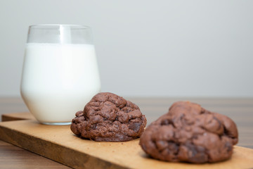 Chocolate cookies on wooden table