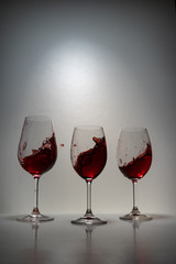 red wine splash in glass