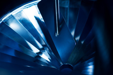 blue tone jet engine blades closeup