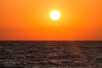 Fototapeta na wymiar sunset over the sea romantic evening in the tropics