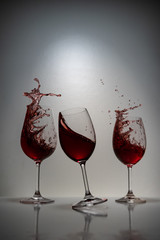 red wine splash in glass