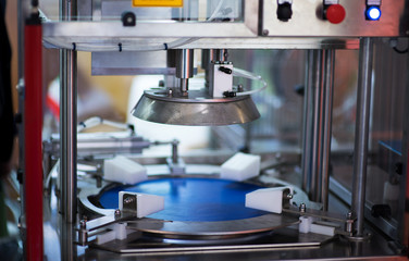 Recycle plastic bottle stack to conveyor line . Plastic recycling industry is recovering scrap or waste plastic from recycle bin to useful products. pile of reused material at recycling factory.