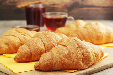 Croissants with marmalade and tea