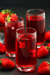 Glasses with strawberry drink with ice	