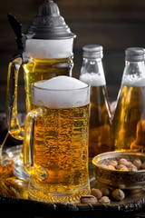 Light beer in a glass on the table