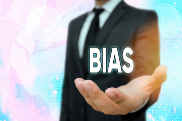 Conceptual hand writing showing Bias. Concept meaning inclination or prejudice for or against one...