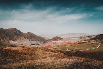Road going through Kyrgyz mountain range