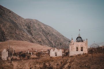 Old cemetery in a mountain valley