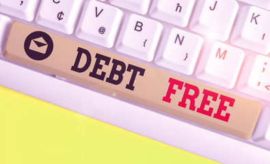 Conceptual hand writing showing Debt Free. Concept meaning does not owning any money or things to...