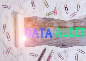 Writing note showing Data Audit. Business concept for auditing of data to assess its quality for a...